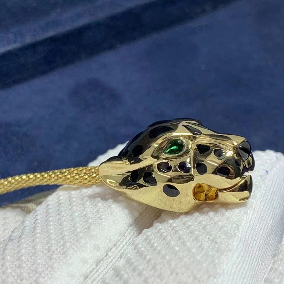 18k yellow gold 2 tsavorite garnets onyx panthere de cartier and diamond bracelet n6700517 1