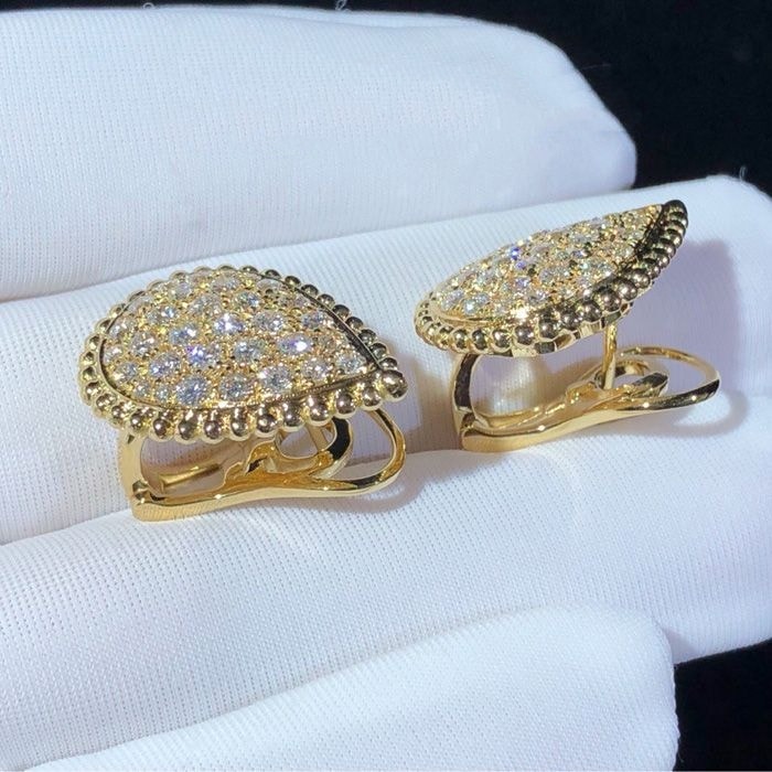 boucheron serpent boheme 18k yellow gold ear clips l motif