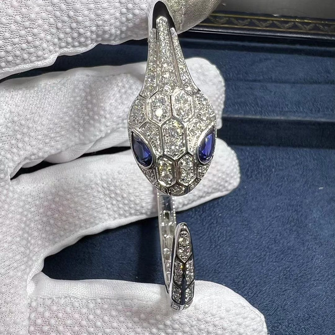bvlgari 18k white gold set with blue sapphire eyes and pave diamonds serpenti bangle bracelet 354100