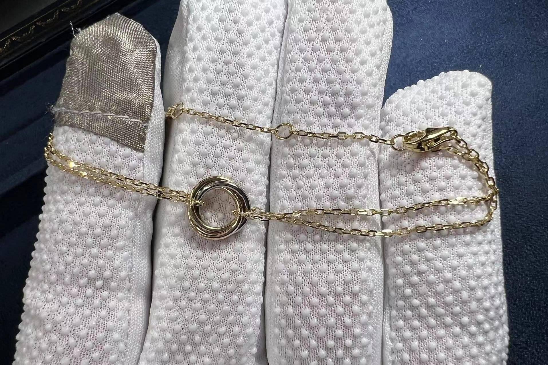 cartier trinity 18k three tone gold double chain bracelet b6036818 1