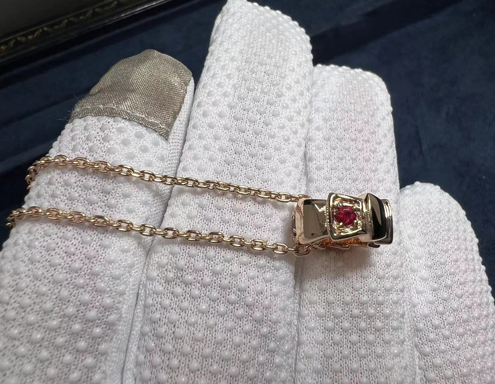 custom made bvlgari serpenti necklace set with carnelian elements and demi pave ruby 5