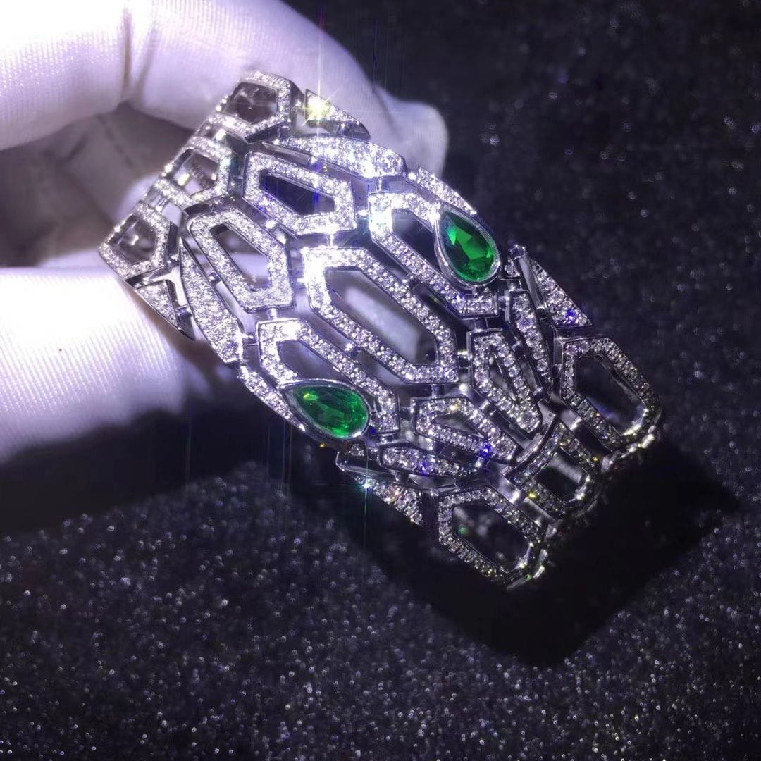high jewelry bvlgari serpenti seduttori diamond bracelet 18k white gold with emerald eyes 1