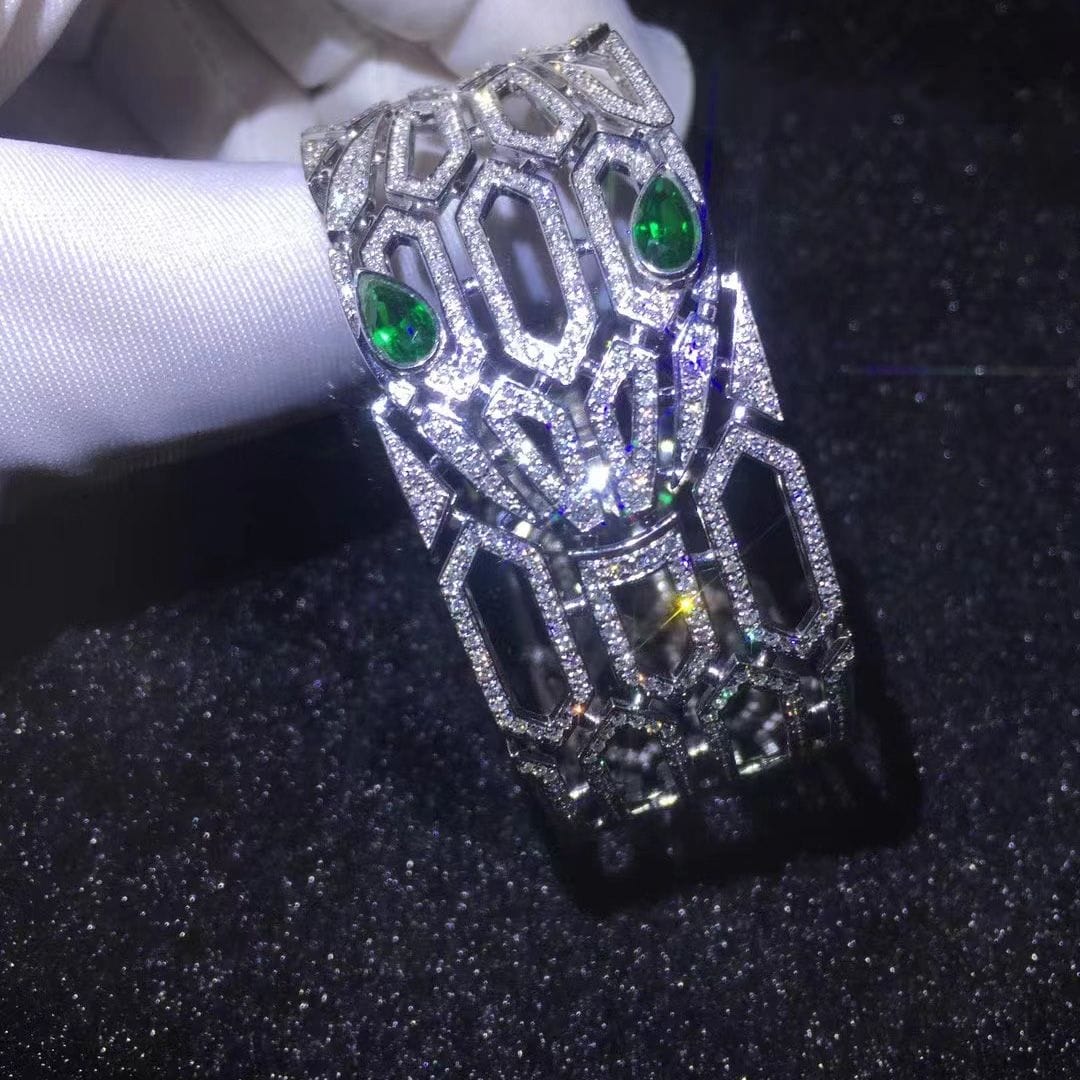 high jewelry bvlgari serpenti seduttori diamond bracelet 18k white gold with emerald eyes