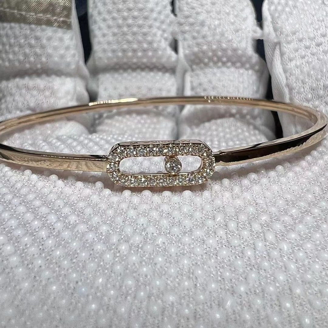 messika move uno 18 karat rose gold diamond bangle