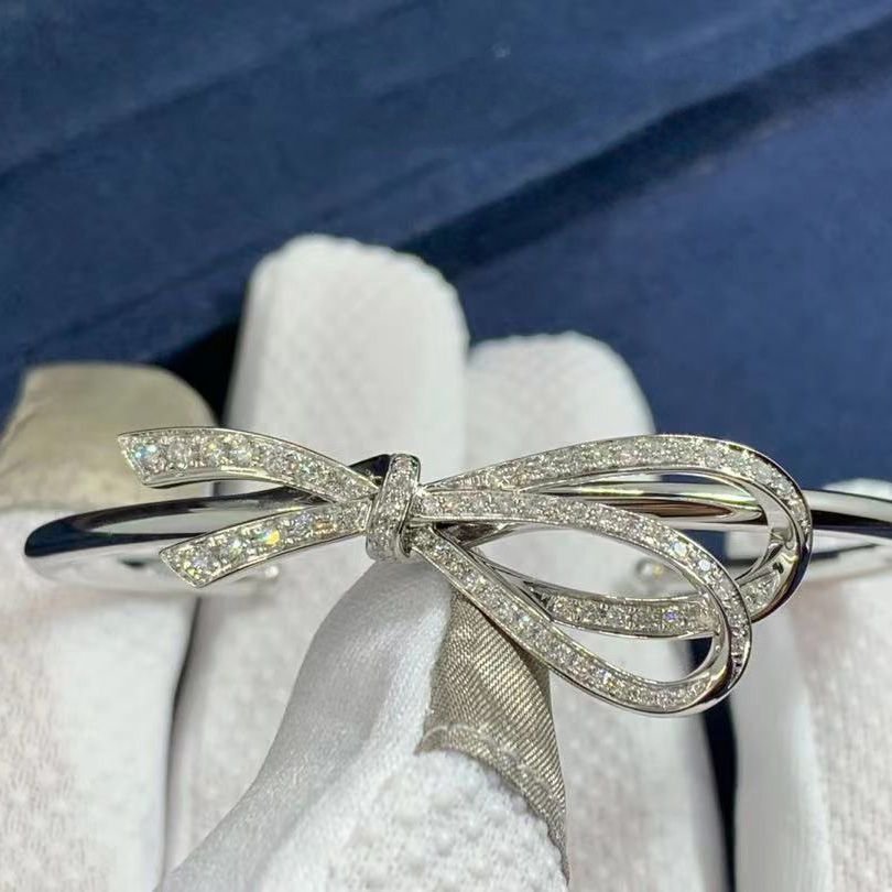 tiffany co. 0.82 ctw diamond 18 karat white gold tiffany bow cuff bracelet
