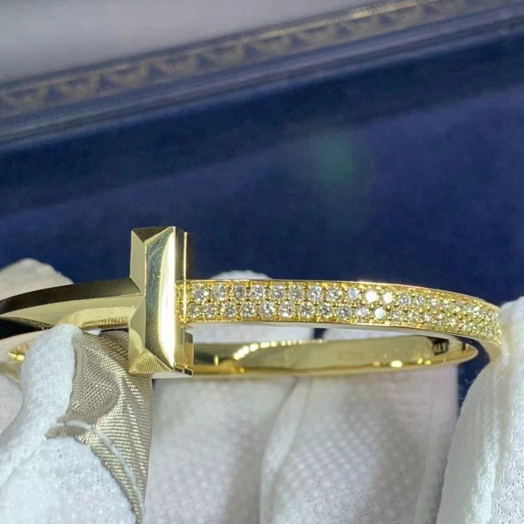 tiffany co. t t1 wide diamond hinged 18 karat yellow gold size large bangle bracelet