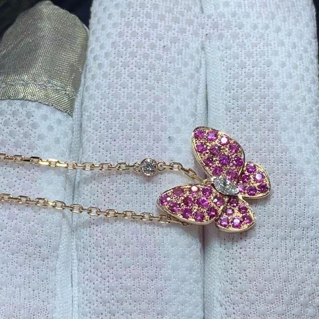 van cleef arpels 18k rose gold two butterfly diamond pink sapphire and tsavorite pendant necklace vcaro3m200