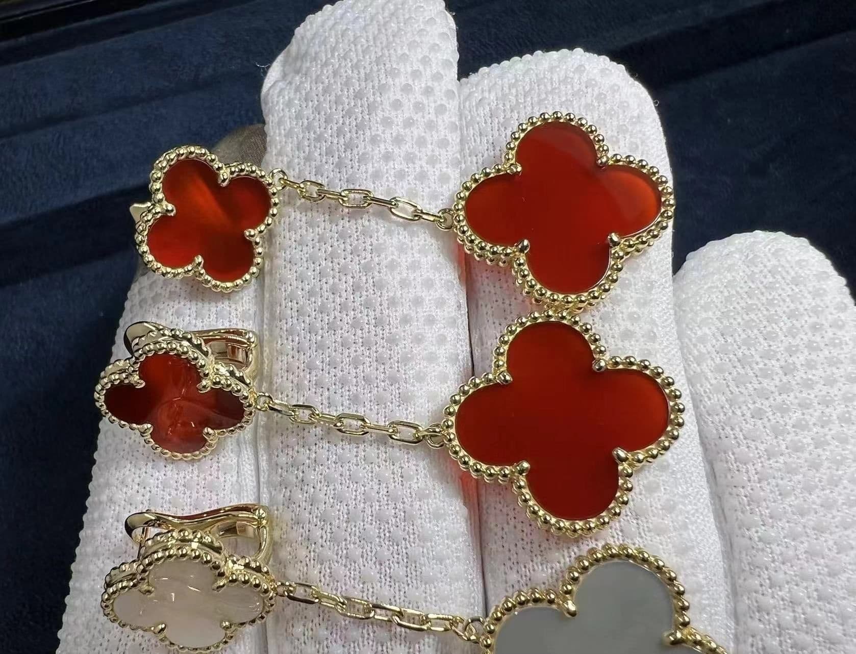 van cleef arpels 18k yellow gold mother of pearl 2 motifs magic alhambra earrings vcard78800 1