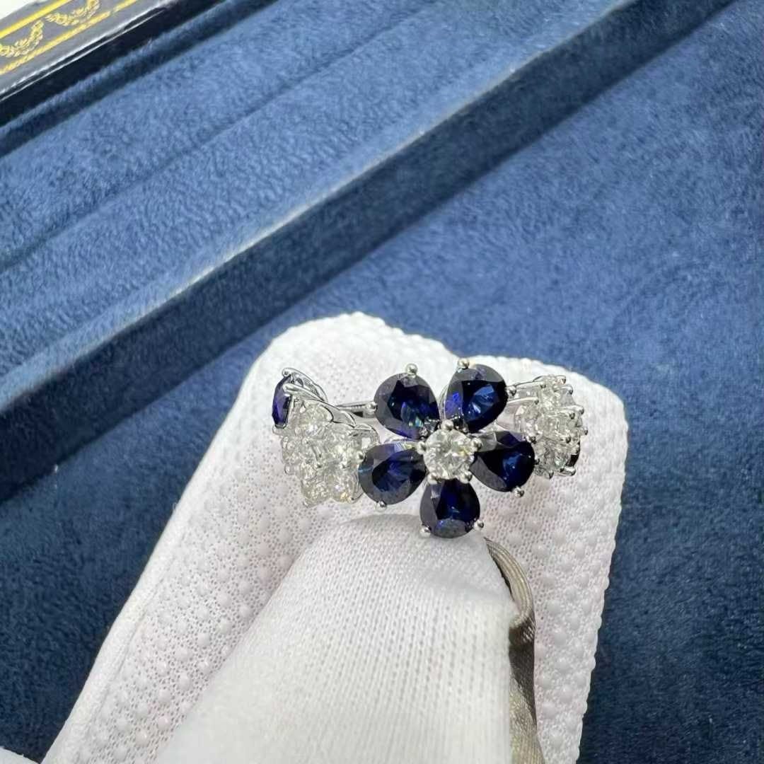 van cleef arpels folie des pres diamond blue sapphire 18k white gold flower ring vcarp05700